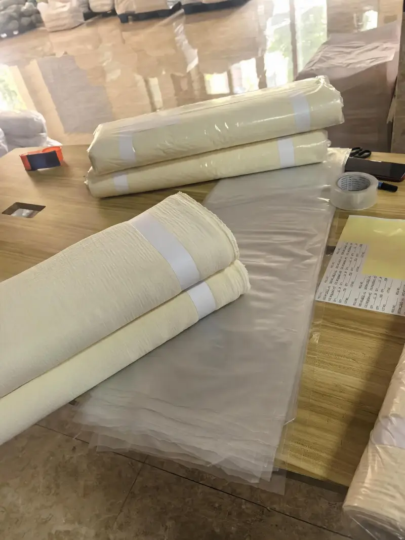Packing table with labeled rolls